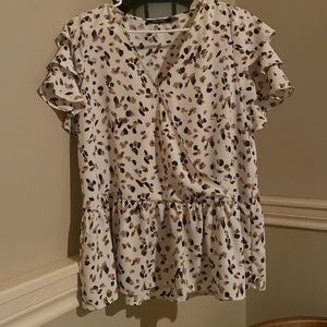 A medium, polyester, Doe and Rae dress shirt with V-neck and ruffled sleeves